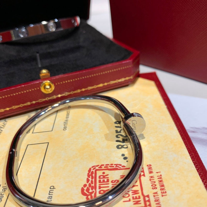 Close-up detail view of Cartier unisex jewelry piece