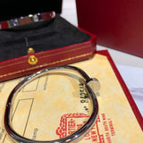 Close-up detail view of Cartier unisex jewelry piece