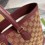 Top view of modern statement women's handbag – women's luxury accessory