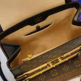 Handle and strap detail of classic modern women's handbag – women's luxury accessory
