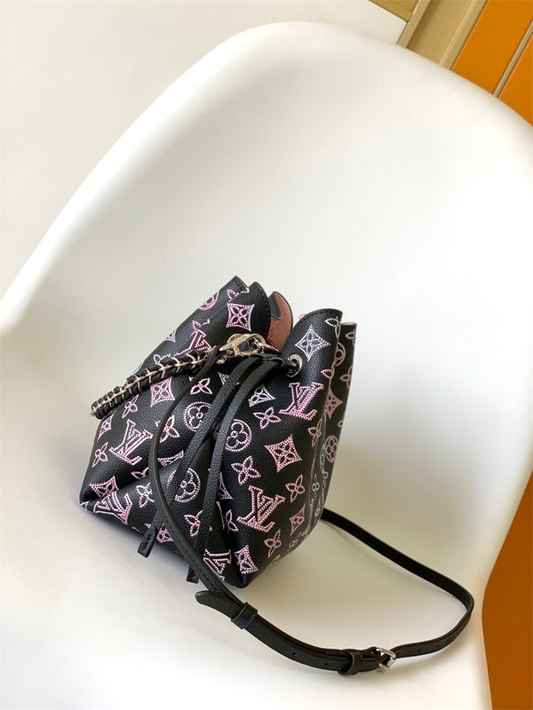  Understated structured bag carried on shoulder