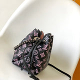  Understated structured bag carried on shoulder