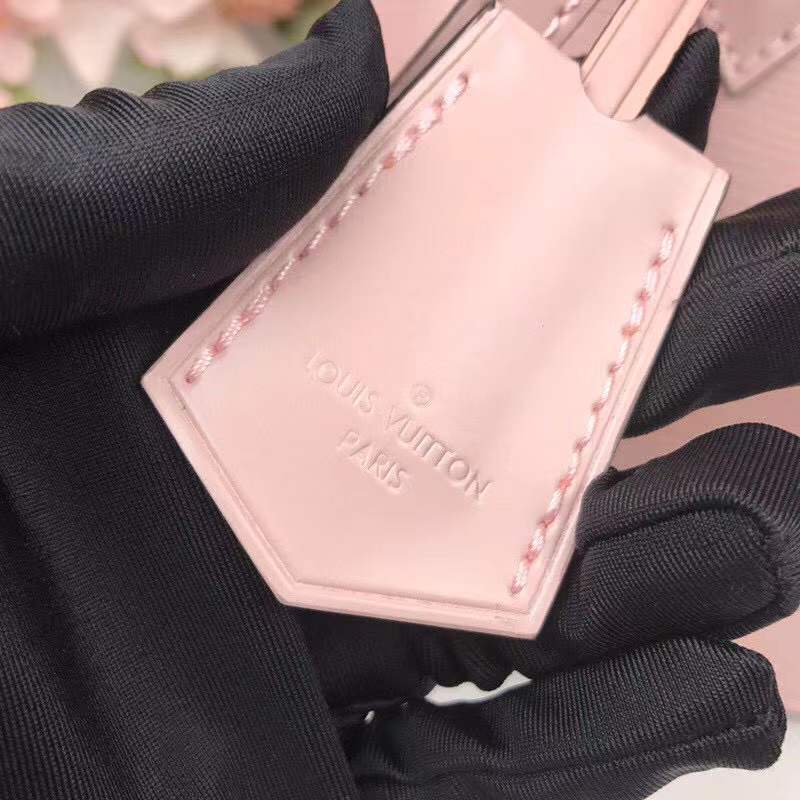 Handle and strap detail of chic everyday-luxe women's handbag – women's designer-style accessory