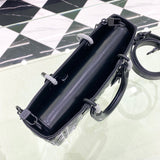 Top view of elevated modern women's handbag – women's luxury accessory