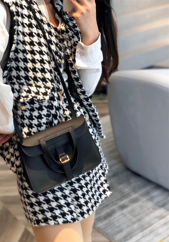 Side view of chic structured handbag
