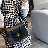Side view of chic structured handbag