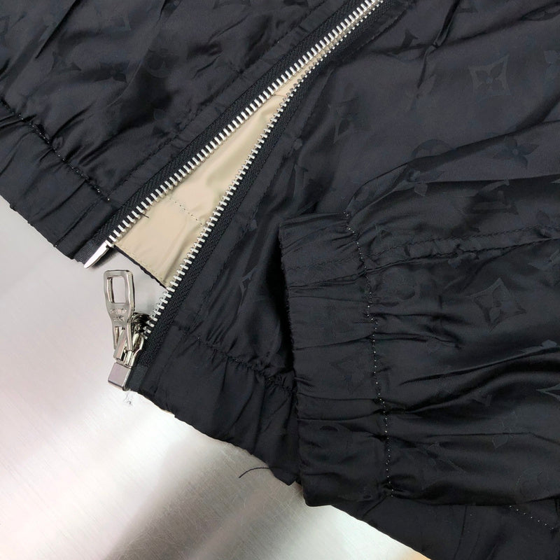 Front view of Louis Vuitton luxury clothing with signature branding