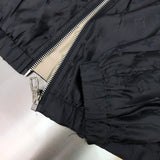 Front view of Louis Vuitton luxury clothing with signature branding