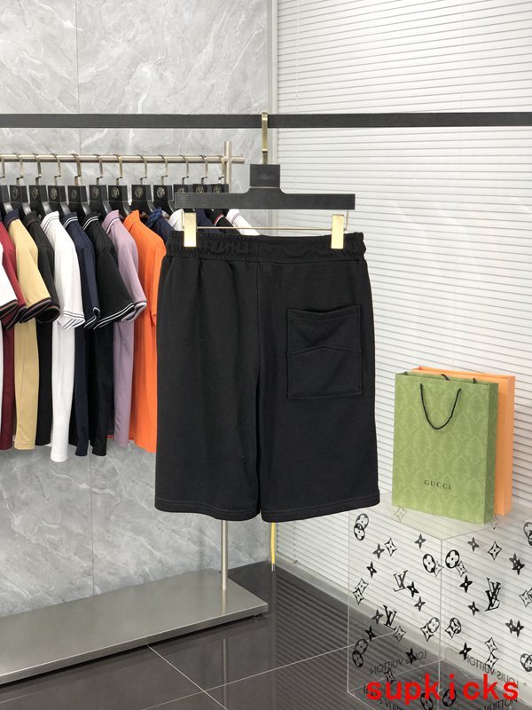 Side profile of Rhude luxury clothing with logo-detail design