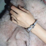 Lifestyle view of Cartier unisex jewelry piece