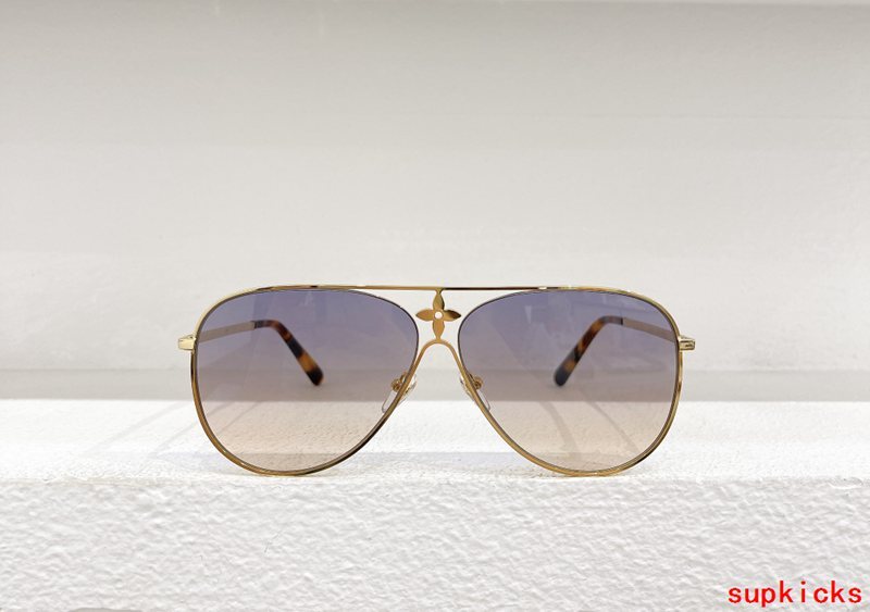 Close-up detail view of Louis Vuitton unisex sunglasses