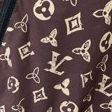 Side profile of Louis Vuitton luxury clothing with label-forward styling