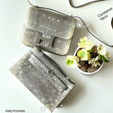 Side view of timeless structured handbag