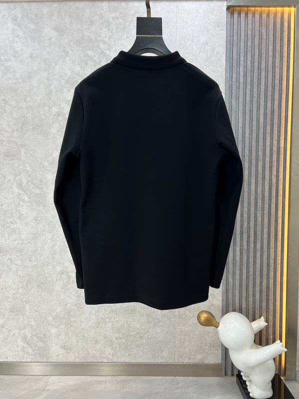 Side profile of Louis Vuitton luxury clothing with label-forward styling