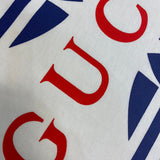 Back view of Gucci luxury clothing with signature branding