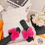 Hermès Red Knee-High Boots - Angled View