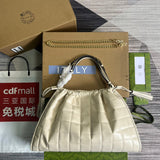 Side profile of chic signature women's handbag – women's statement bag
