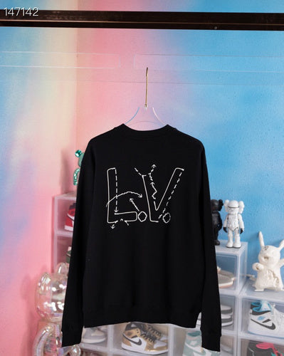Full styled look of Louis Vuitton luxury clothing with tailored silhouette