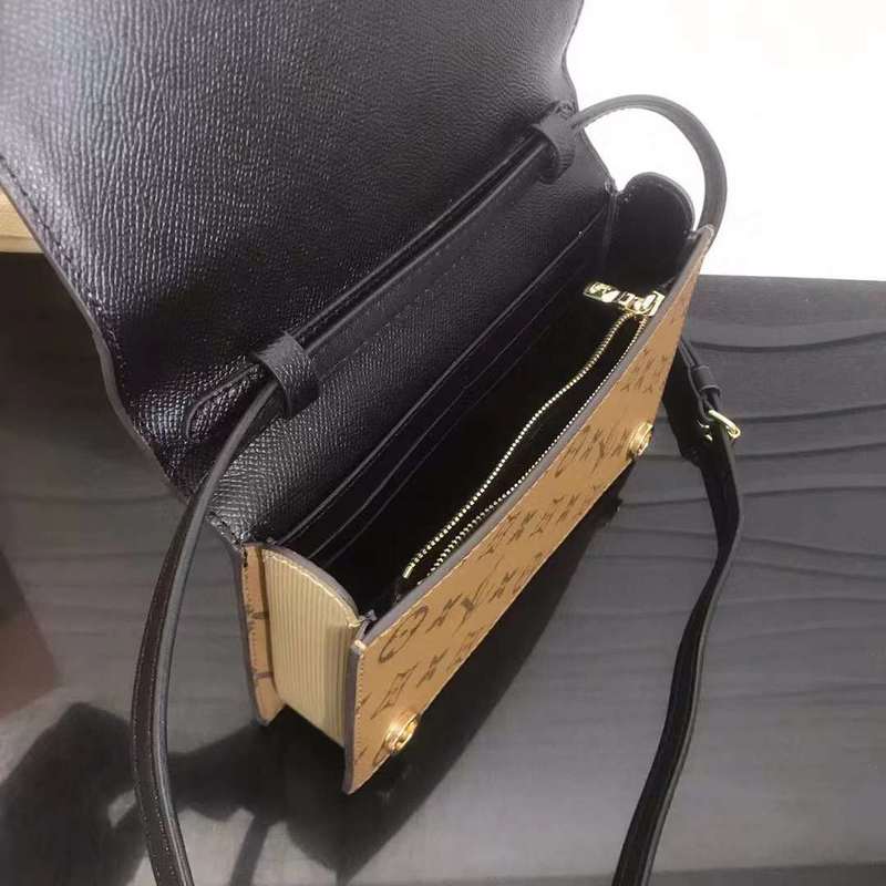 Side profile of signature polished women's handbag – women's everyday handbag