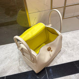 Side view of sleek structured handbag