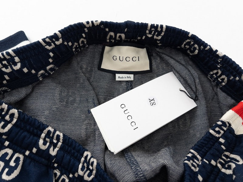 Front view of Gucci luxury clothing with monogram-inspired silhouette