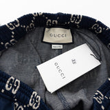 Front view of Gucci luxury clothing with monogram-inspired silhouette