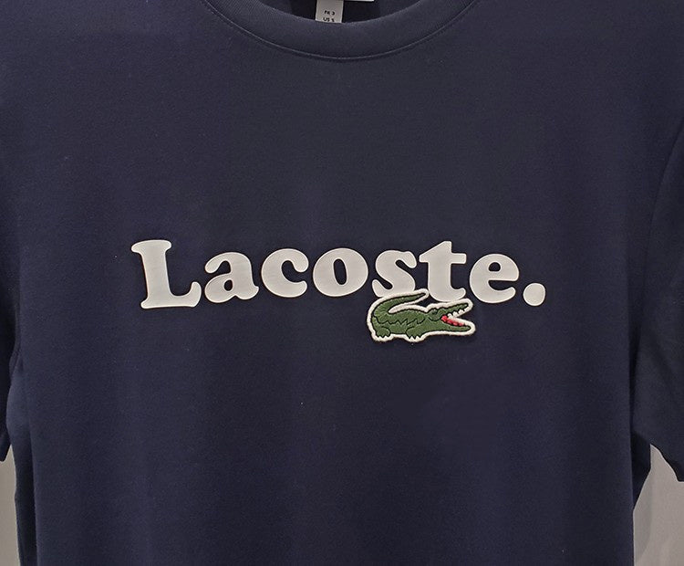 Back view of Lacoste luxury clothing with signature branding