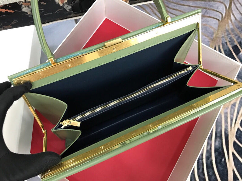 Handle and strap detail of everyday-luxe structured women's handbag – women's luxury accessory