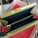 Handle and strap detail of everyday-luxe structured women's handbag – women's luxury accessory