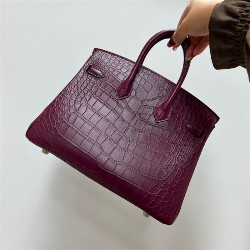 Streamlined handbag styled for everyday wear
