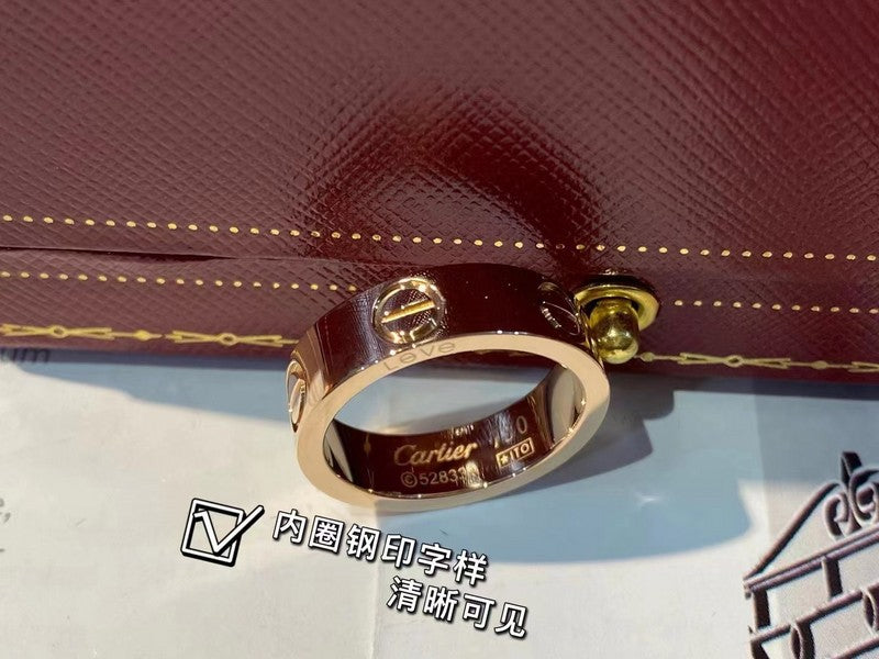 Side view of Cartier unisex jewelry piece