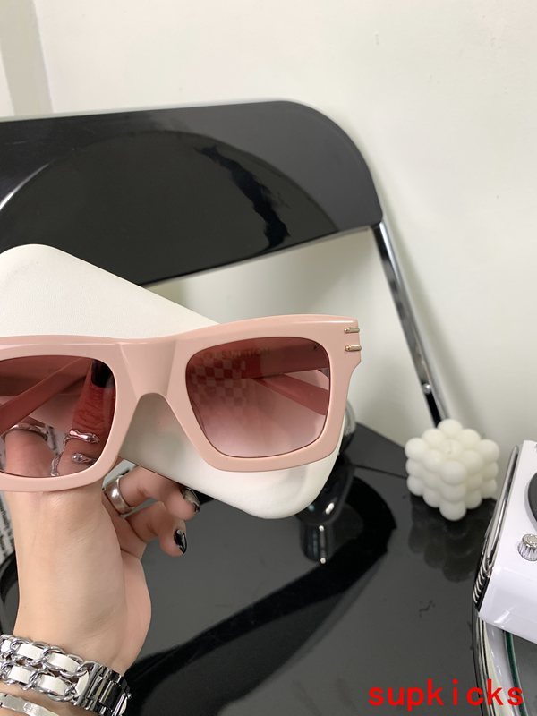 Close-up detail view of Louis Vuitton unisex sunglasses