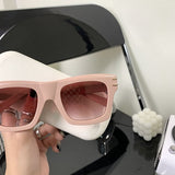 Close-up detail view of Louis Vuitton unisex sunglasses