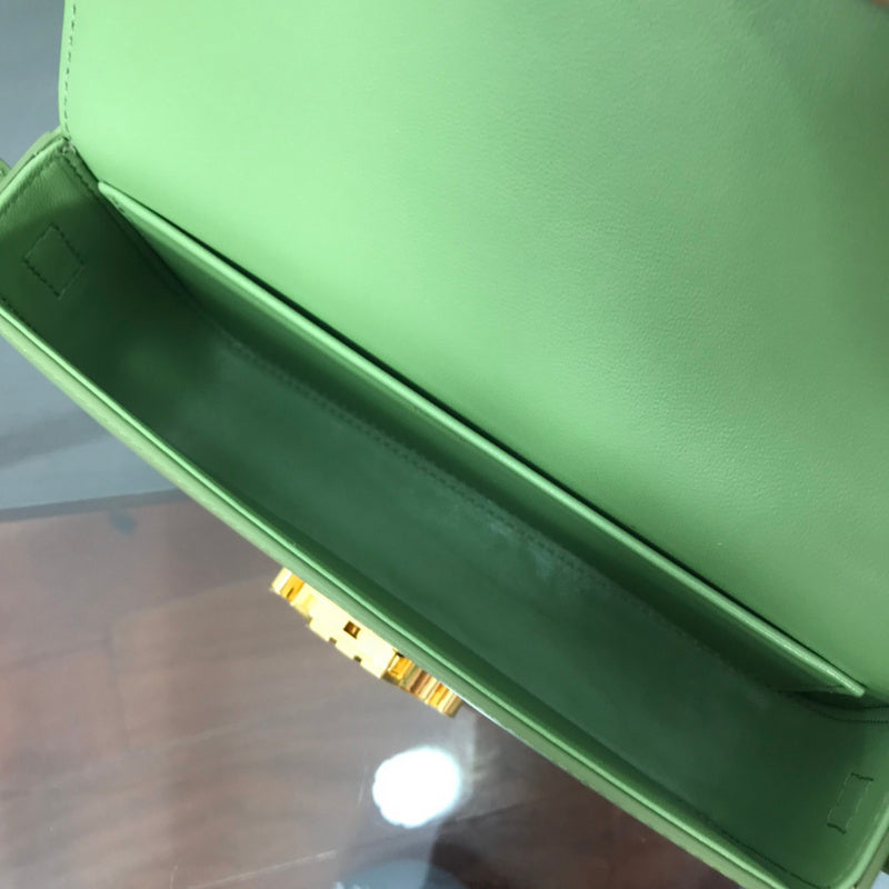 Front view of modern elevated women's handbag – women's designer-style accessory
