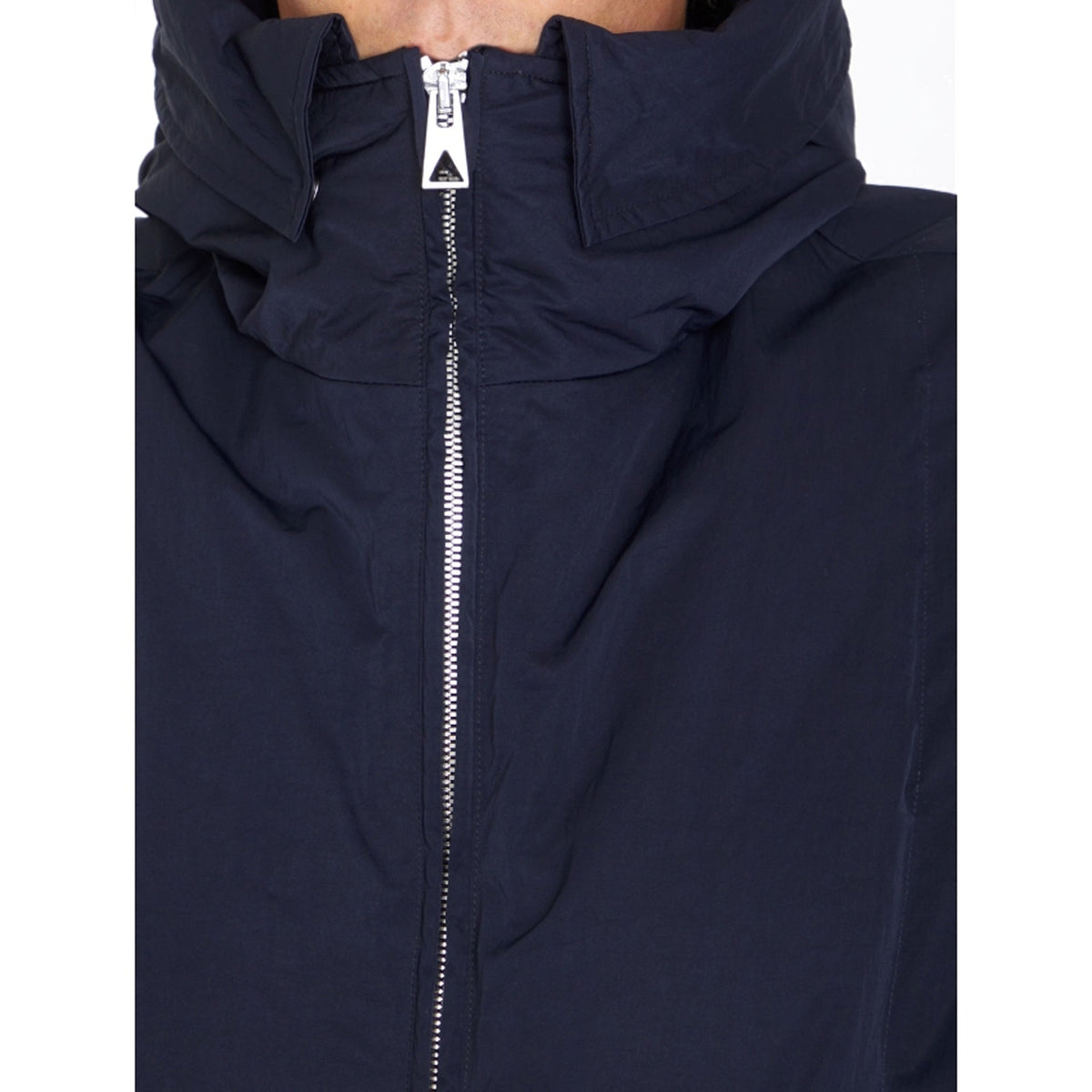 Close-up of Bottega Veneta jackets hardware and fine stitching