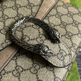 Styled lifestyle shot of chic polished women's handbag – women's designer-style accessory