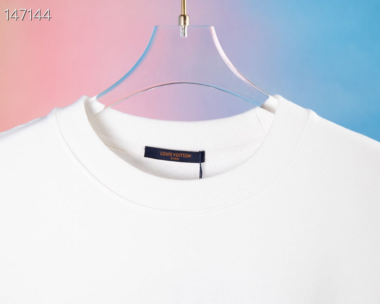 Side profile of Louis Vuitton luxury clothing with tailored silhouette