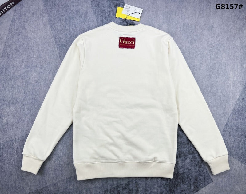 Side profile of Gucci luxury clothing with signature branding