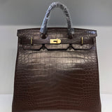Side view of sophisticated structured handbag
