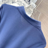 Close-up detail shot of Moncler luxury clothing with tailored silhouette