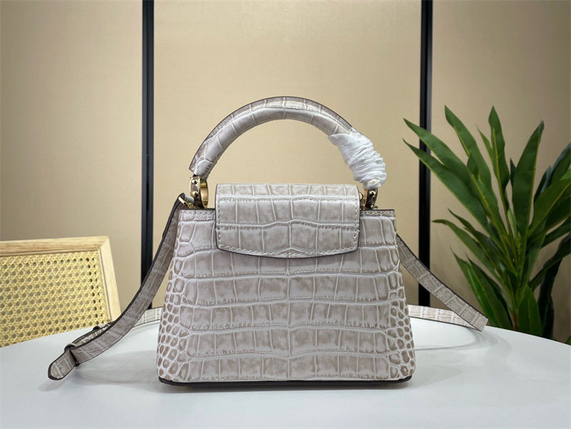  Streamlined crossbody bag carried on shoulder