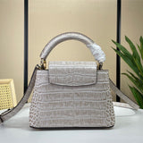 Streamlined crossbody bag carried on shoulder