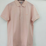 Side profile of Lacoste luxury clothing with signature branding