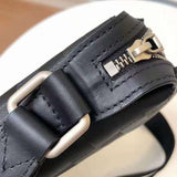 Handle and strap detail of modern classic women's handbag – women's luxury handbag