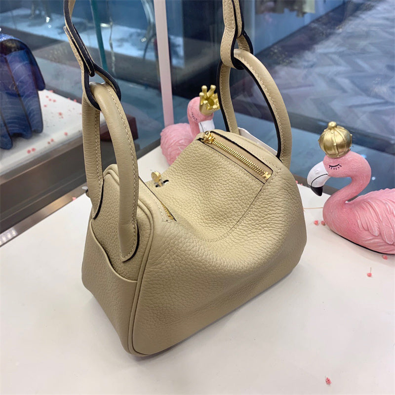 Side view of versatile structured handbag