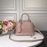 Side profile of chic everyday-luxe women's handbag – women's designer-style accessory