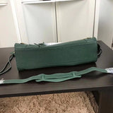 Styled lifestyle shot of premium signature women's handbag – women's everyday handbag