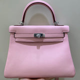 Side view of polished structured handbag