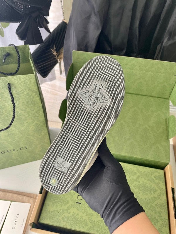 Gucci two-tone luxury sneakers view 5 signature lace-up style