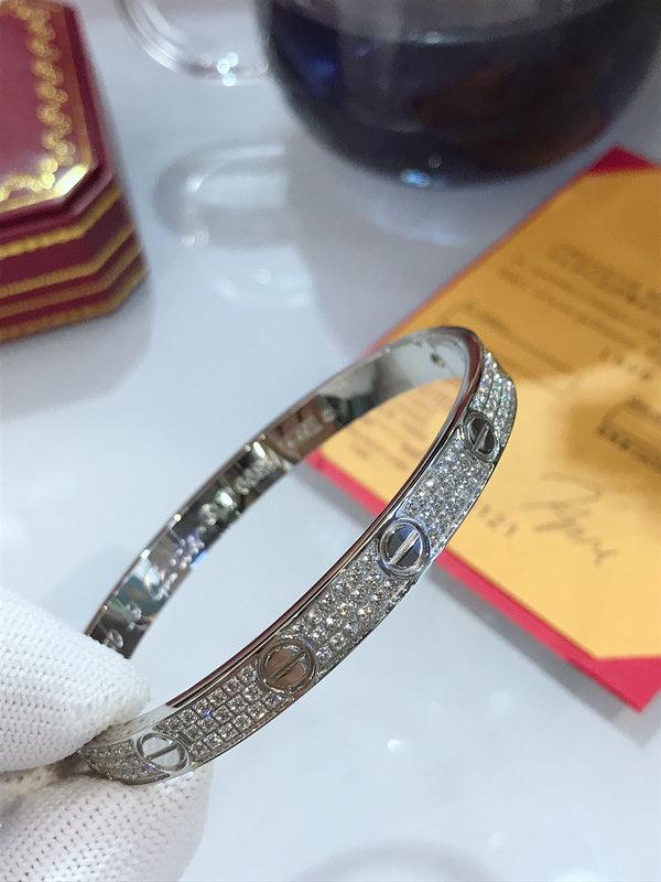 Close-up detail view of Cartier unisex jewelry piece